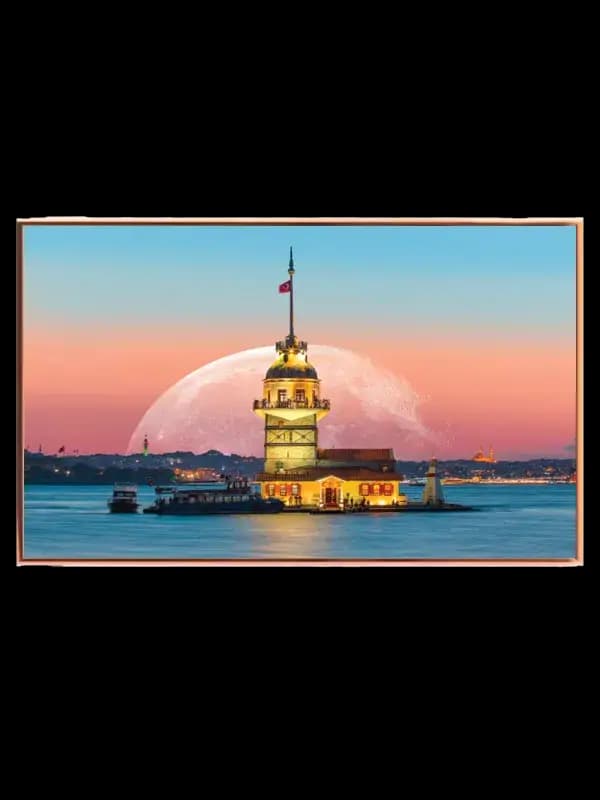 A Illuminated Tower At Sunset